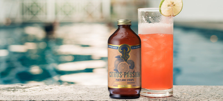 Syrup on a dock with a cocktail